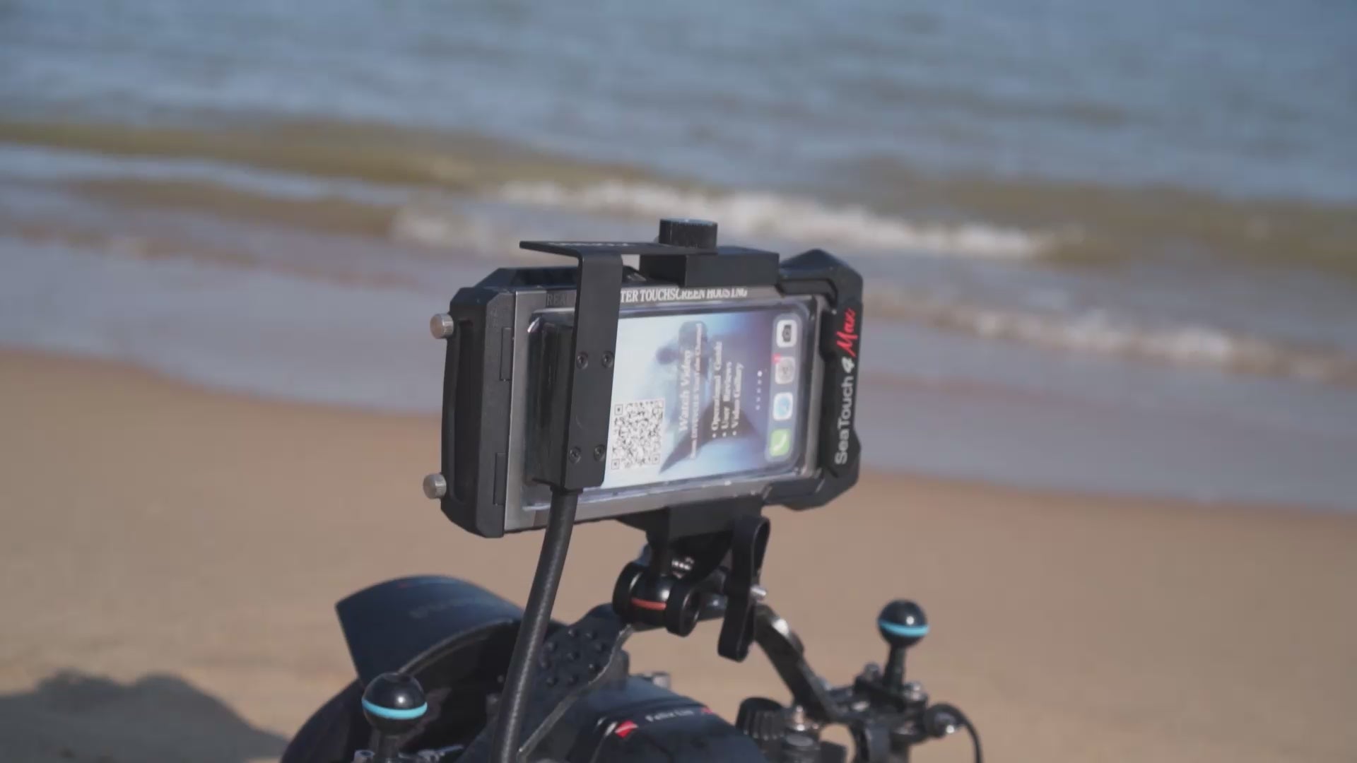 SeaLink Underwater Wi-Fi Signal Transmitter in use as a monitor and camera control device
