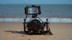 SeaLink Underwater Wi - Fi Signal Transmitter mounted on a Nauticam Waterproof Camera Housing on a Beach