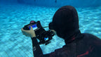 SeaLink Underwater Wi - Fi Signal Transmitter being used by a freediver in a pool
