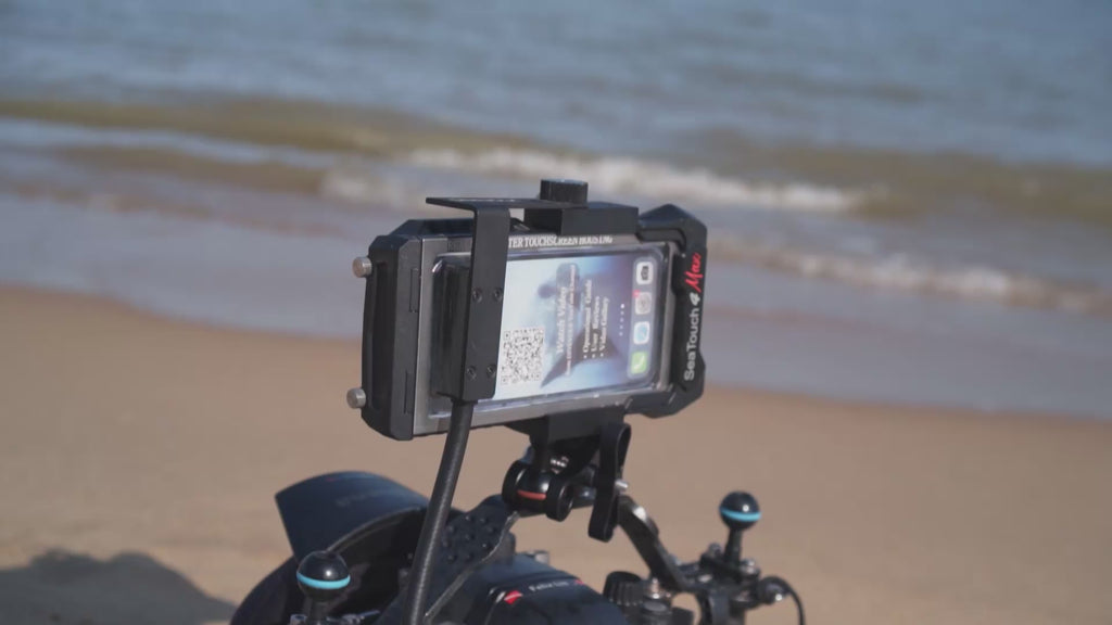 SeaLink Underwater Wi-Fi Signal Transmitter in use as a monitor and camera control device